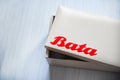 Box shoe Bata logo banner and red wording