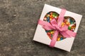 Box with sweet chocolate candies on color background, Various candy sweets. Valentines day gift box. Top view flat lay Royalty Free Stock Photo