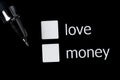 A box to tick off your choice between love and money. Squares on a black background