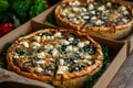 Box of vegetarian galettes with chard and feta cheese