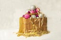 A Box Woven From The Bark With Christmas Tree Decorations, With Christmas Balls And Ribbons And Gold Beads