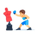 Boxer boy training with punching dummy. Teenager boxing, hitting a Punching bag - mannequin. Fitness, sport, training