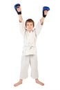 Boxer boy in white dress and blue boxing gloves Royalty Free Stock Photo