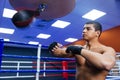 Boxer exercising with the speed bag