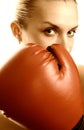 Boxer girl in red gloves Royalty Free Stock Photo