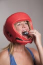 Boxer inserting a gum shield into the mouth Royalty Free Stock Photo