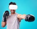 Boxer man, virtual reality glasses and studio with punch, power and workout with 3D user experience. Metaverse boxing Royalty Free Stock Photo