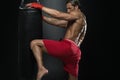 Boxer With Punch Bag In Action Royalty Free Stock Photo