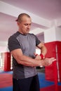 Boxer putting handwraps on Royalty Free Stock Photo