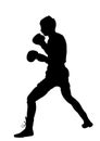 Boxer in ring silhouette. Sparing on boxing training.