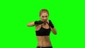 Boxer standing in the front and sends butted an opponent standing on the spot. Green screen. Close up