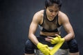 Boxer woman wearing yellow strap on wrist Royalty Free Stock Photo