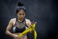 Boxer woman wearing yellow strap on wrist Royalty Free Stock Photo