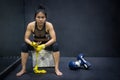 Boxer woman wearing yellow strap on wrist Royalty Free Stock Photo