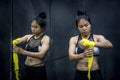 Boxer woman wearing yellow strap on wrist Royalty Free Stock Photo