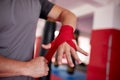 Boxer putting handwraps on Royalty Free Stock Photo