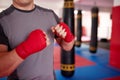 Boxer putting handwraps on Royalty Free Stock Photo