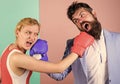 Boxers fighting in gloves. Domination concept. Gender equality. Man and woman boxing fight. Couple in love competing in Royalty Free Stock Photo