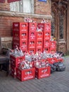 Boxes in the backyard with glass containers. Lots of empty bottles in boxes. Lemonade packaging. Many empty bottles of Zidazeni