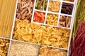 Boxes with different uncooked pasta, top view