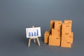 Boxes and easel with charts. Analytical data on cargo transportation and trade. Trade balance, imports and exports ratio. Profits Royalty Free Stock Photo