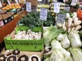 Boxes of fresh vegetables on the counter of famous local farm market Royalty Free Stock Photo