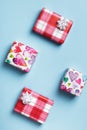 Boxes with gifts on a blue background. Mother`s day valentine. Flat lay, top view