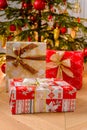 Boxes with gifts near the Christmas tree Royalty Free Stock Photo