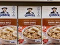 Quaker instant oatmeal boxes on a store shelf