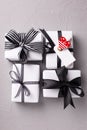 Boxes with presents with red heart on grey  textured background. Royalty Free Stock Photo