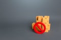 Boxes and prohibition symbol NO. Trade wars. A ban on the import of goods. Impossibility of transportation, oversupply. Shortage Royalty Free Stock Photo