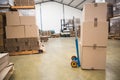 Boxes on trolley in warehouse Royalty Free Stock Photo