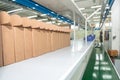 Boxes in a warehouse in the logistics sector ready to be packaged on the assembly line - transport and processing of orders in Royalty Free Stock Photo