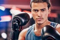 Boxing, boxer and man with fitness boxing gloves in portrait, sport training and motivation for healthy life. Athlete