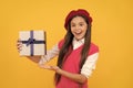 boxing day. cheerful kid in beret. smiling child has birthday. teenage beauty go shopping.
