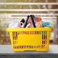 Boxing day. Shopping basket with gifts in supermarket Royalty Free Stock Photo