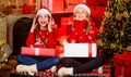 Boxing day. Happy holidays. Fun and cheer. Children cheerful christmas eve. Christmas gifts concept. Sisterhood. Sharing Royalty Free Stock Photo