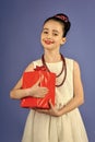 Boxing day, holiday celebration and party. Small girl with shopping package, black friday. Childhood and happiness, gift