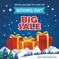 Boxing Day Sale Design with gift boxes, Paper bag, and snowy landscape Royalty Free Stock Photo