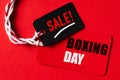 Boxing day Sale text on a red and black tag. Shopping Royalty Free Stock Photo