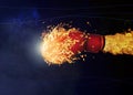 Boxing glove with flame flying on dark background