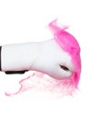 Boxing glove hit pink sand and explode. White Boxer glove impact sand splash as exercise training. White background isolated