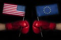 Boxing gloves with European Union and United States flag. USA and the European Union confrontation and relations concept Royalty Free Stock Photo