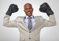 Boxing gloves, portrait and black man celebrate business victory for justice achievement, legal battle or law firm Royalty Free Stock Photo