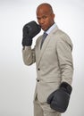 Boxing gloves, studio portrait and black man, business fighter or attorney fight injustice or government law. Battle Royalty Free Stock Photo