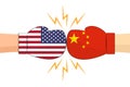 Boxing gloves between USA and China flags on white background