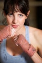 Boxing, hands and portrait of woman with confidence, power and fearless training challenge in gym. Strong body, muscle