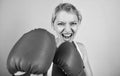 Boxing improve temper and will. Woman boxing gloves focused on attack. Ambitious girl fight boxing gloves. Female rights