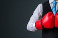 Boxing manager with red gloves on black background Royalty Free Stock Photo