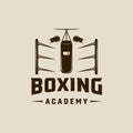 boxing ring and punch bag logo vector vintage illustration template icon graphic design. fight sport sign or symbol for academy